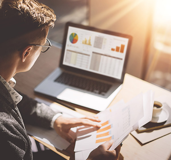 man looking at online lending portfolio