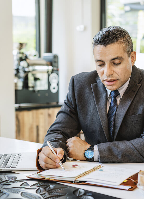 Banker at work with calendar